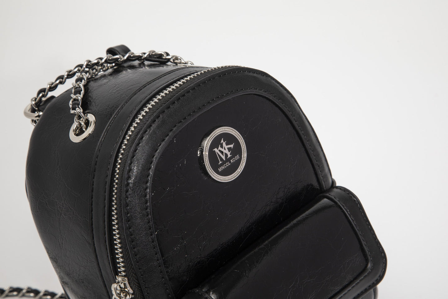GESSY CHAIN STRAP SMALL BACKPACK IN BLACK