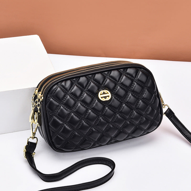 GESSY QUILTED DIAMOND SHAPE CROSSBODY BAG IN BLACK