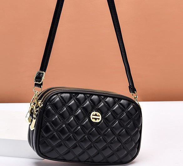 GESSY QUILTED DIAMOND SHAPE CROSSBODY BAG IN BLACK