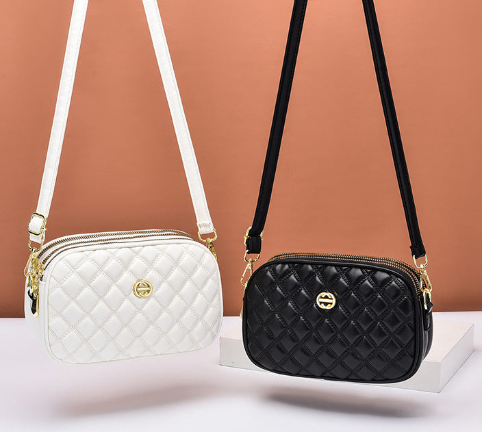 GESSY QUILTED DIAMOND SHAPE CROSSBODY BAG IN BLACK