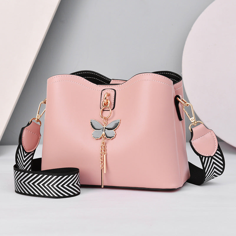GESSY BUTTERFLY TASSEL DECOR MAGNETIC SNAP CROSSBODY BAG IN PINK
