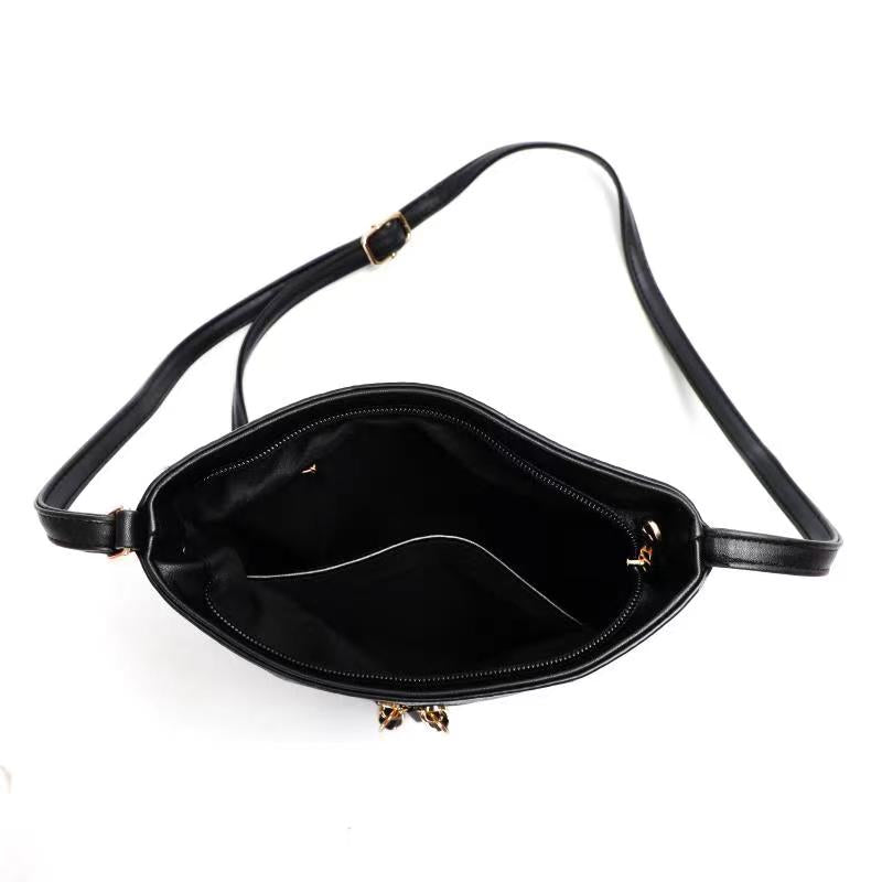 GESSY CHECKERED DOUBLE-SIDED ZIP CROSSBODY BAG IN BLACK