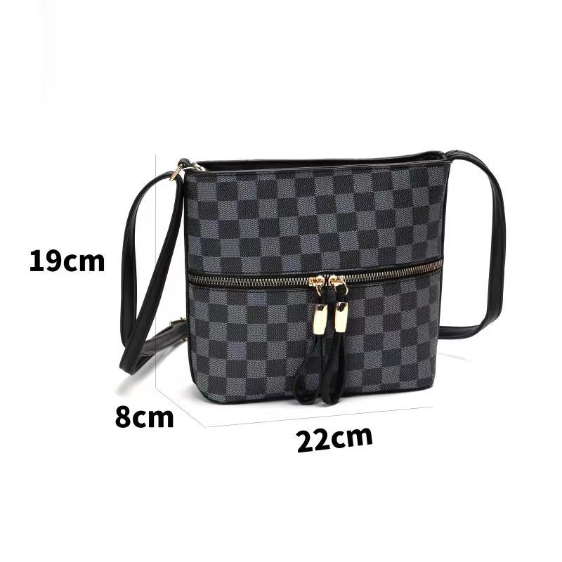 GESSY CHECKERED DOUBLE-SIDED ZIP CROSSBODY BAG IN BLACK