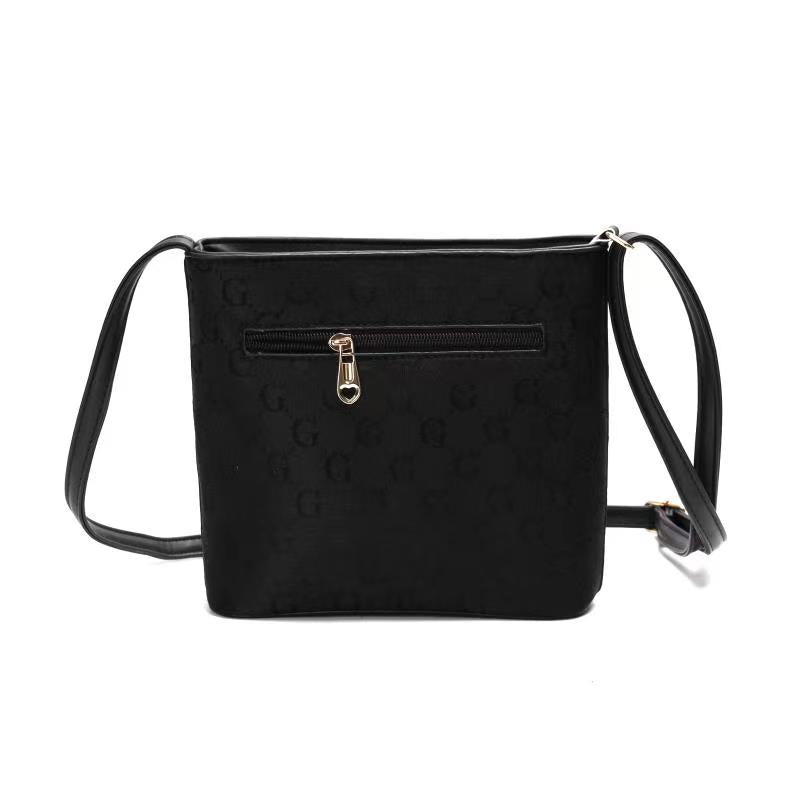 GESSY CHECKERED DOUBLE-SIDED ZIP CROSSBODY BAG IN BLACK
