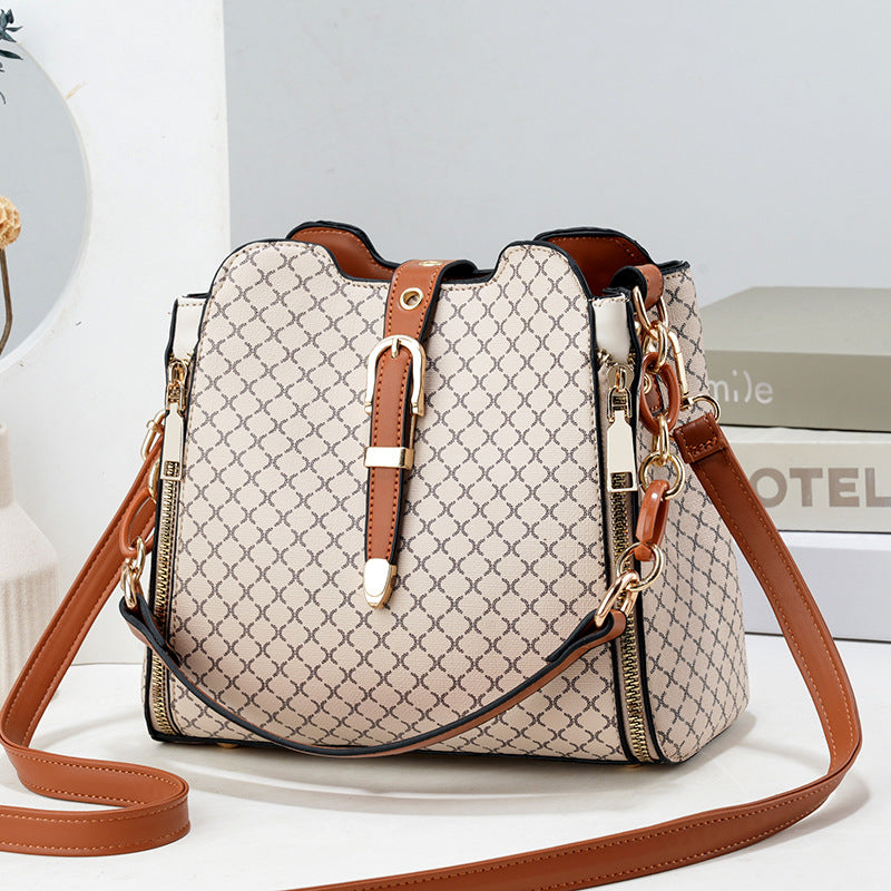 GESSY RETRO MESH PRINT METAL SNAP BUCKET BAG IN KHAKI