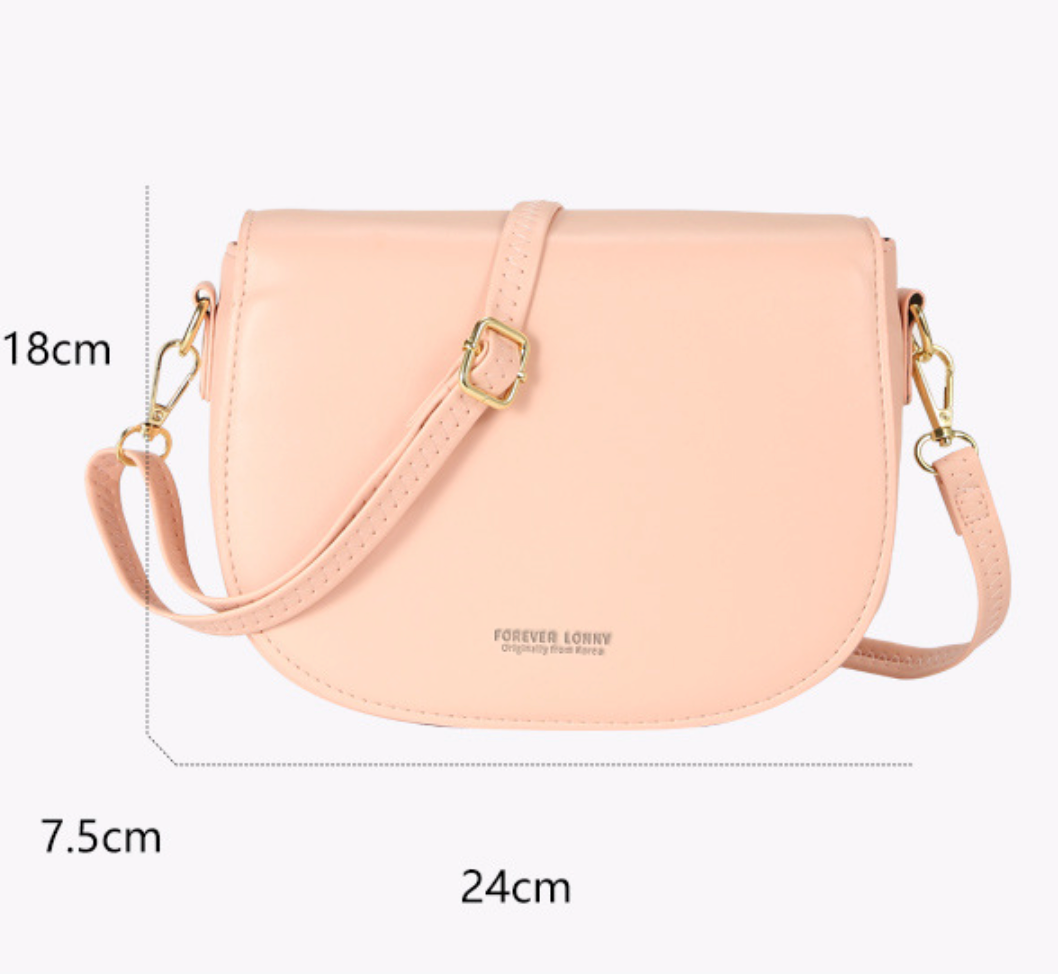 GESSY OVAL SHAPED CROSSBODY FLAP BAG IN BLACK