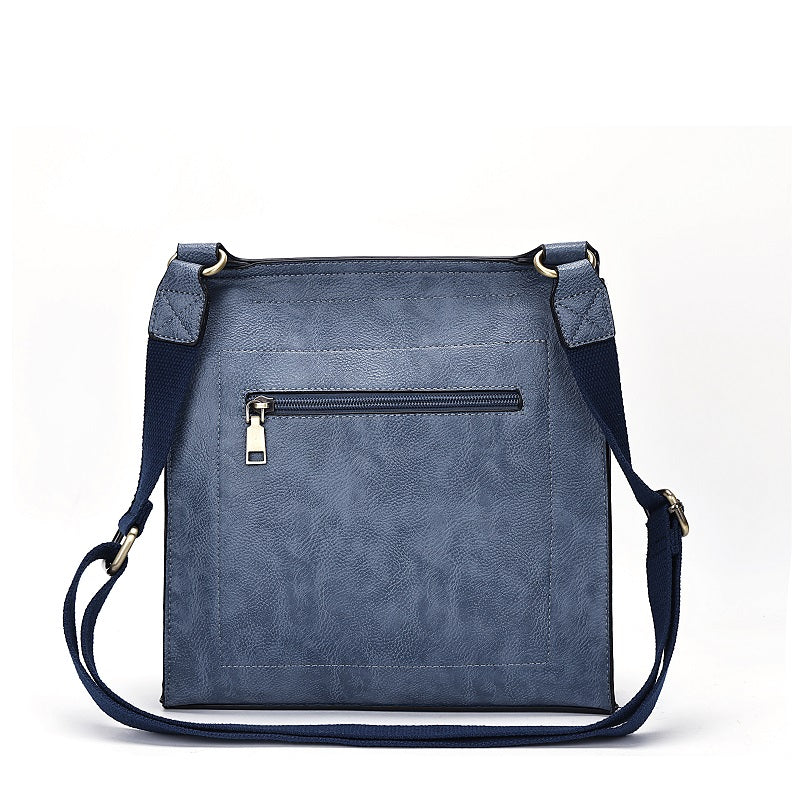GESSY MESSENGER CROSS BODY BAG TWIST LOCKER IN DARK BLUE