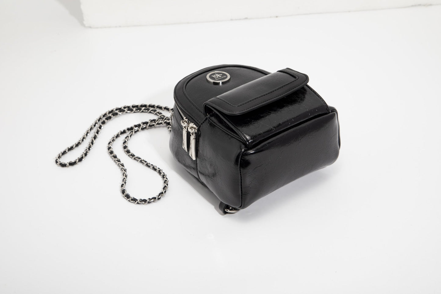 GESSY CHAIN STRAP SMALL BACKPACK IN BLACK
