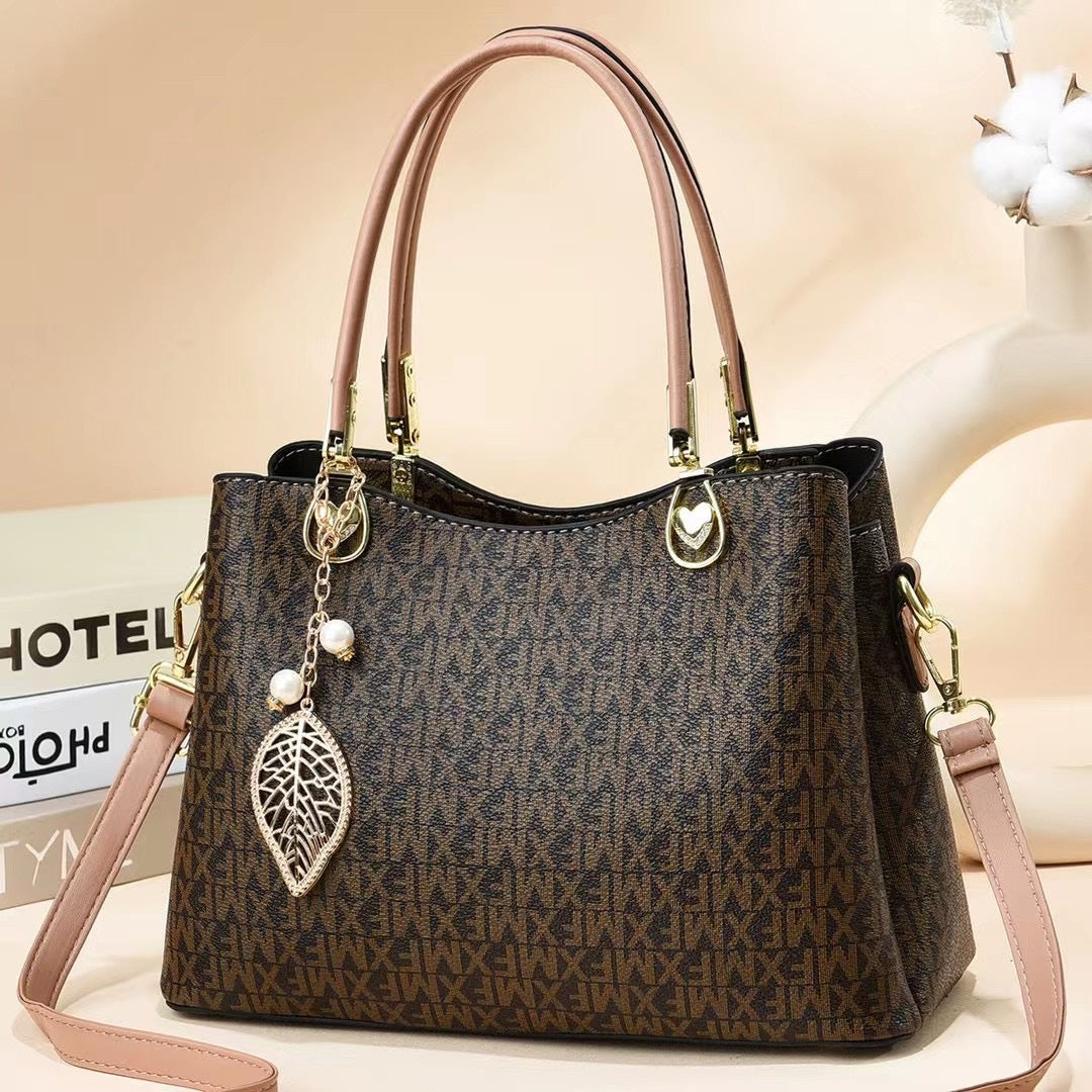 GESSY LETTER PRINT HANDBAG TOTE BAG IN BROWN WITH LEAF PAD
