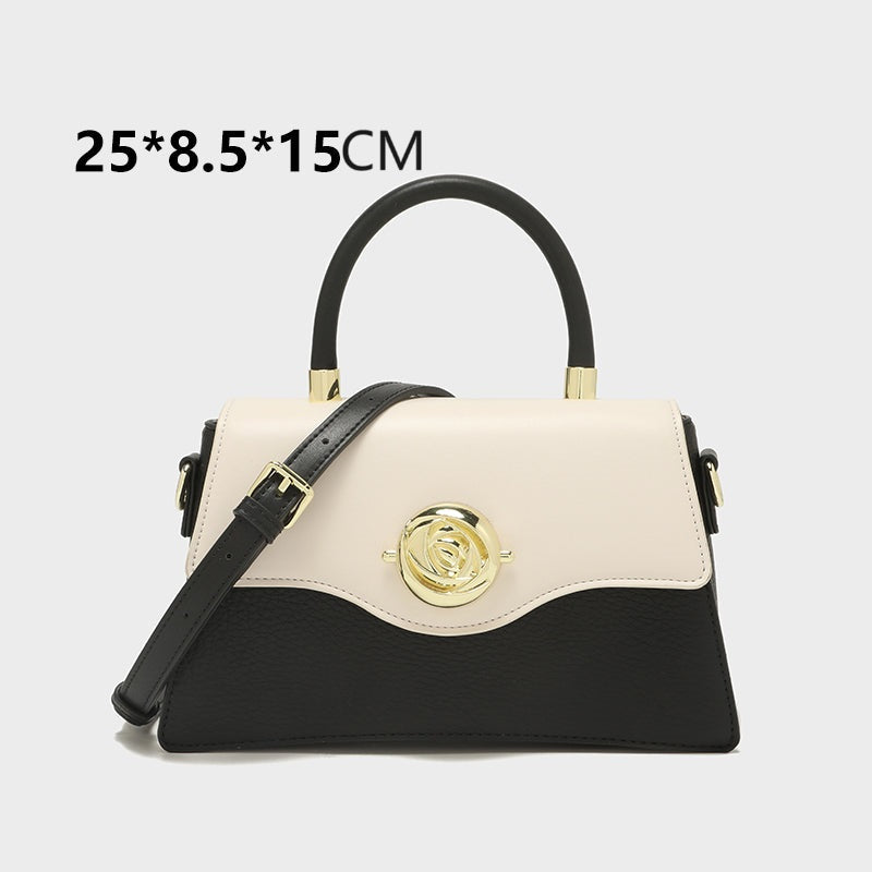 GESSY COLORBLOCK TOP HANDEL FLOWER BUTTON FLAP HANDBAG