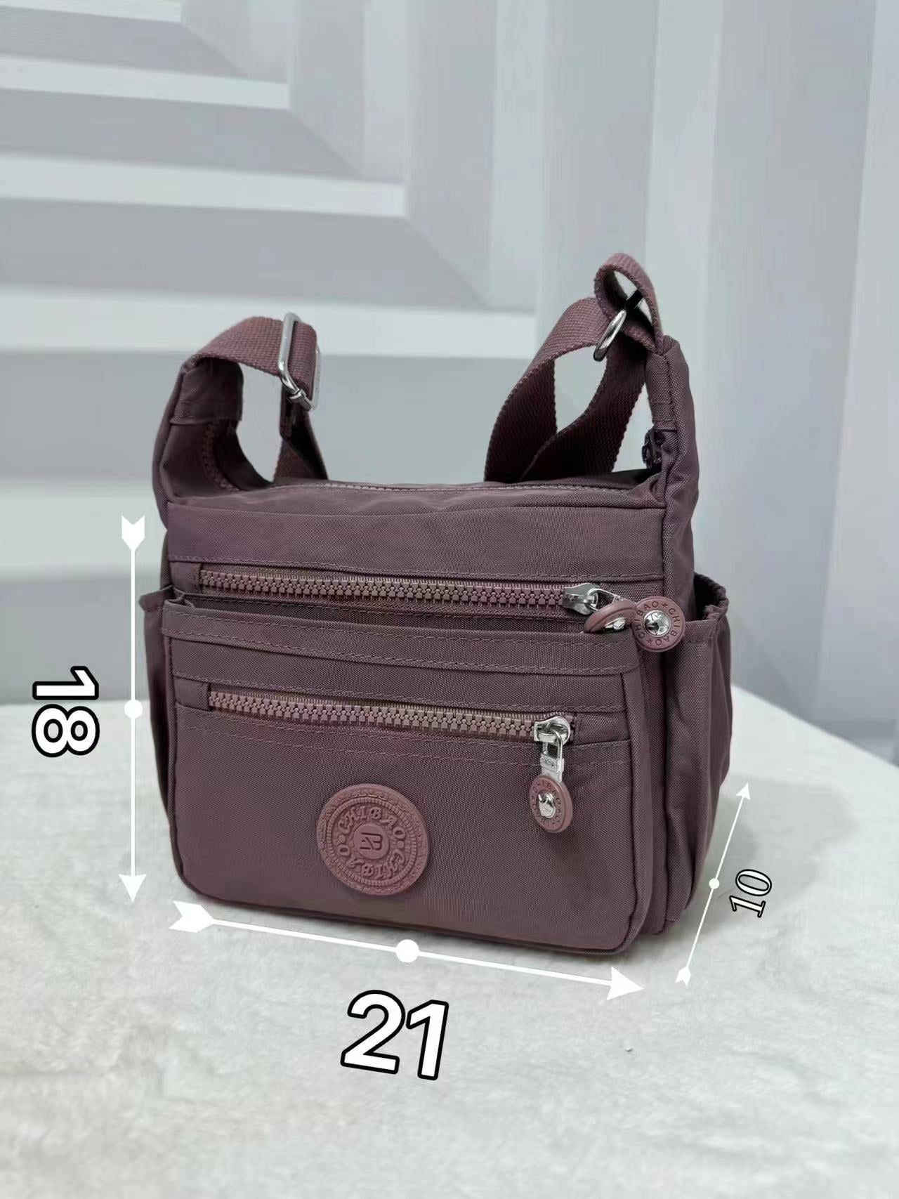 GESSY MULTIFUCTIONAL BAG IN CORAL