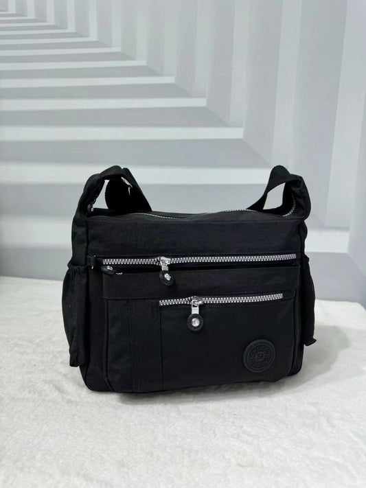 GESSY WATERPROOF UNISEX NYLON CROSSBODY BAG IN BLACK