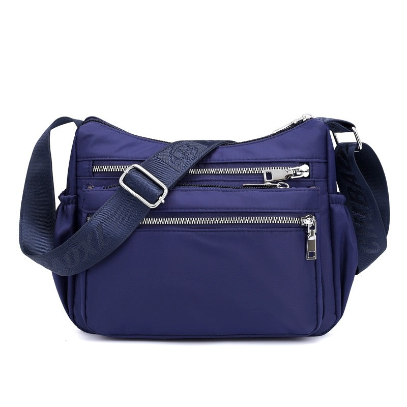 GESSY NYLON MULTI-POCKET CROSSBODY BAG