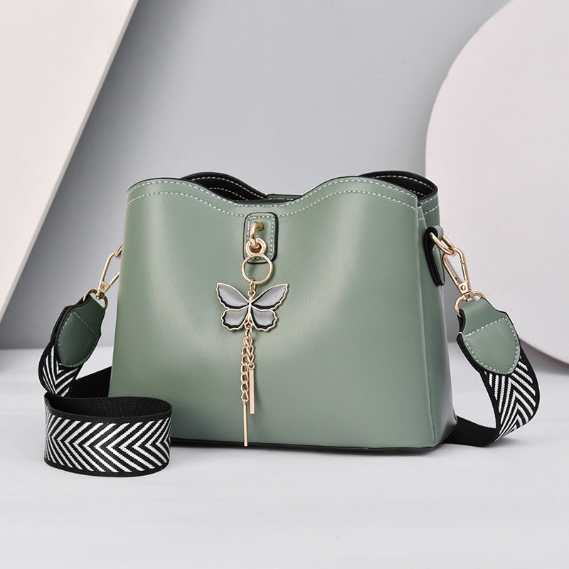 GESSY BUTTERFLY TASSEL DECOR MAGNETIC SNAP CROSSBODY BAG IN GREEN