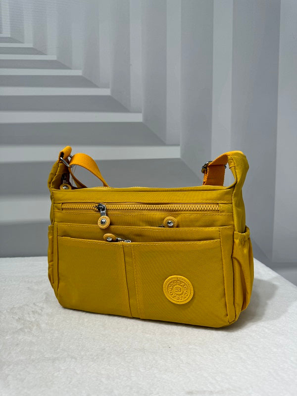 GESSY NYLON MULTIFUCTIONAL CROSSBODY BAG IN YELLOW