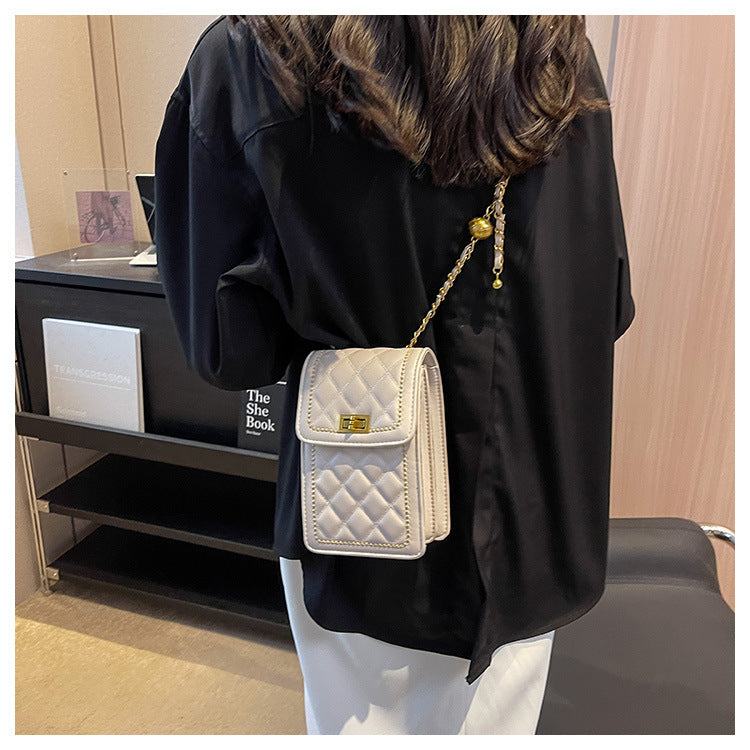 GESSY LOZENGE QUILTED MINI SLING CROSSBODY BAG IN WHITE