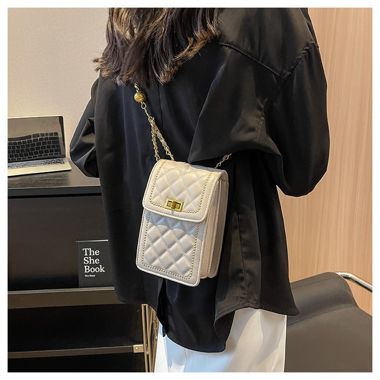 GESSY LOZENGE QUILTED MINI SLING CROSSBODY BAG IN WHITE