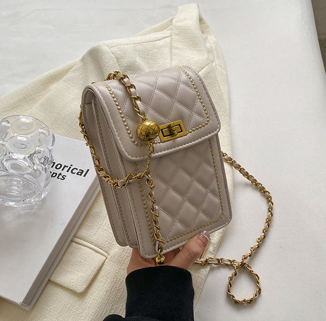 GESSY LOZENGE QUILTED MINI SLING CROSSBODY BAG IN WHITE