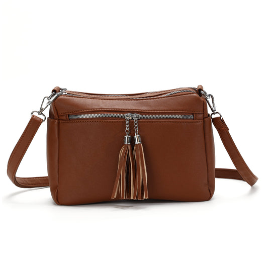 GESSY TASSLE ZIP CROSSBODY BAG IN BROWN