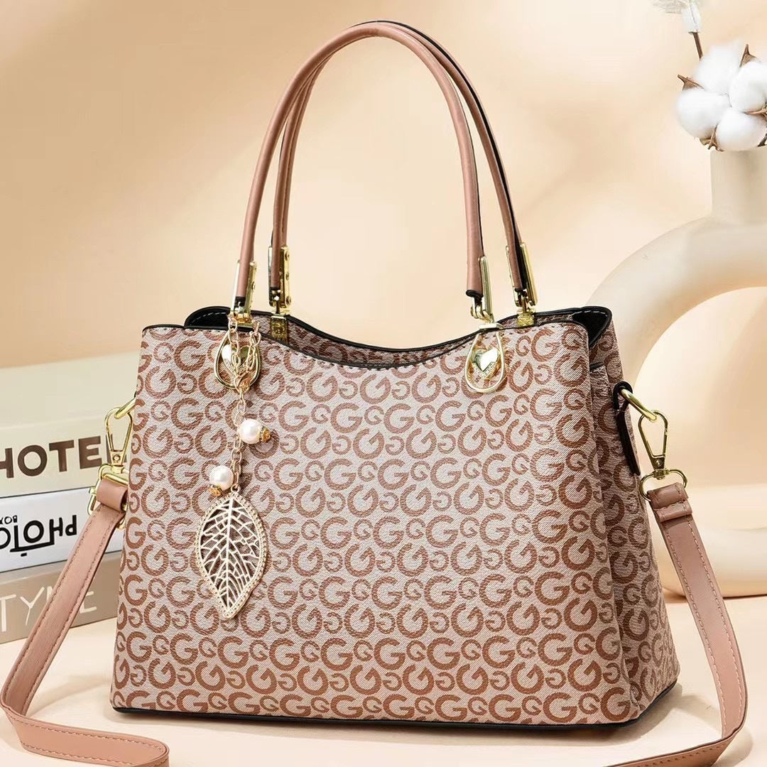 GESSY LOGO PRINT HANDBAG TOTE BAG IN LIGHT BROWN WITH LEAF PAD