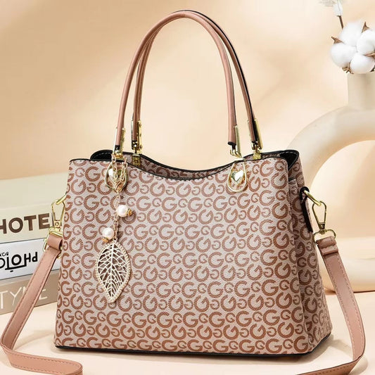 GESSY LOGO PRINT HANDBAG TOTE BAG IN LIGHT BROWN WITH LEAF PAD