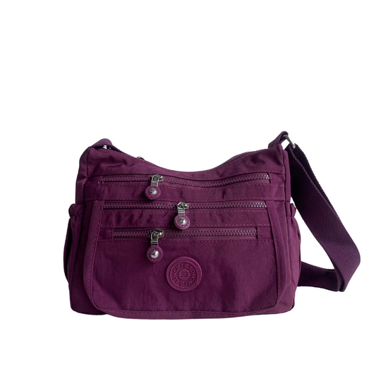 GESSY FRONT TRIPLE ZIP NYLON CROSSBODY BAG IN PURPLE