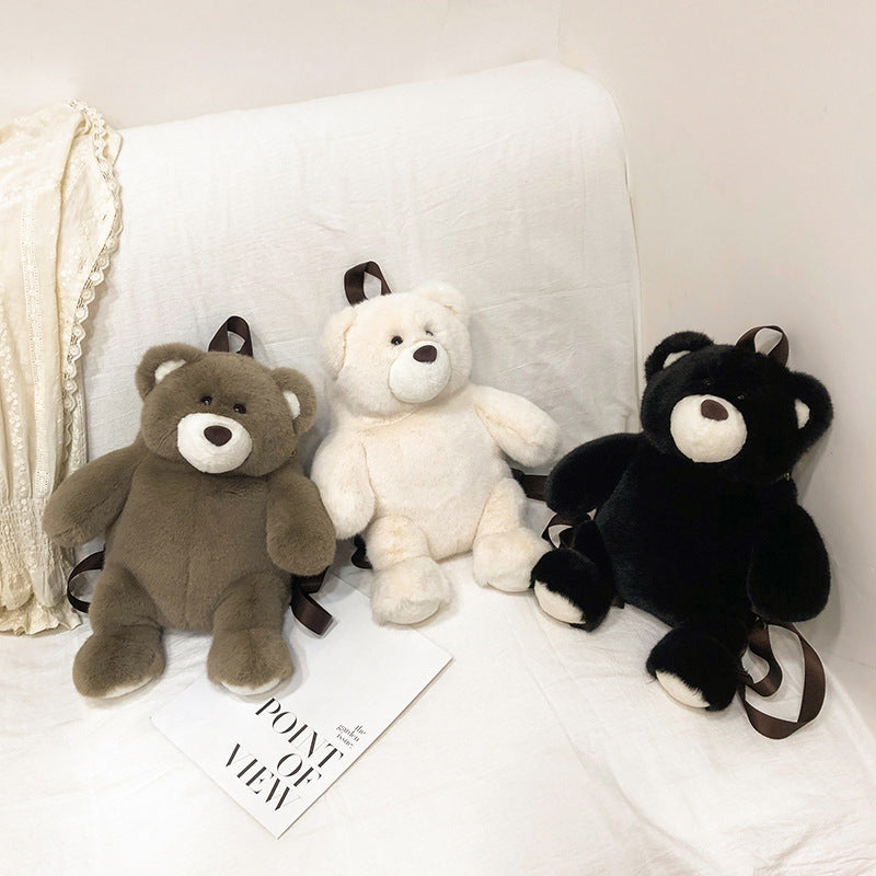 GESSY KID BACKPACK BEAR DOLL IN BLACK