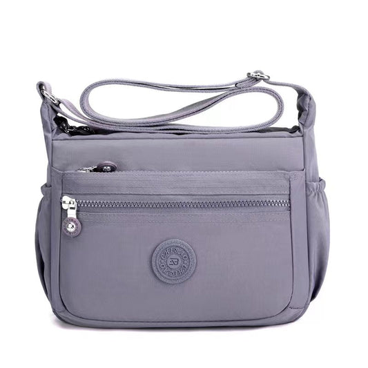 GESSY NYLON FRONT ZIP MULTI-LAYER CROSSBODY BAG IN GREY