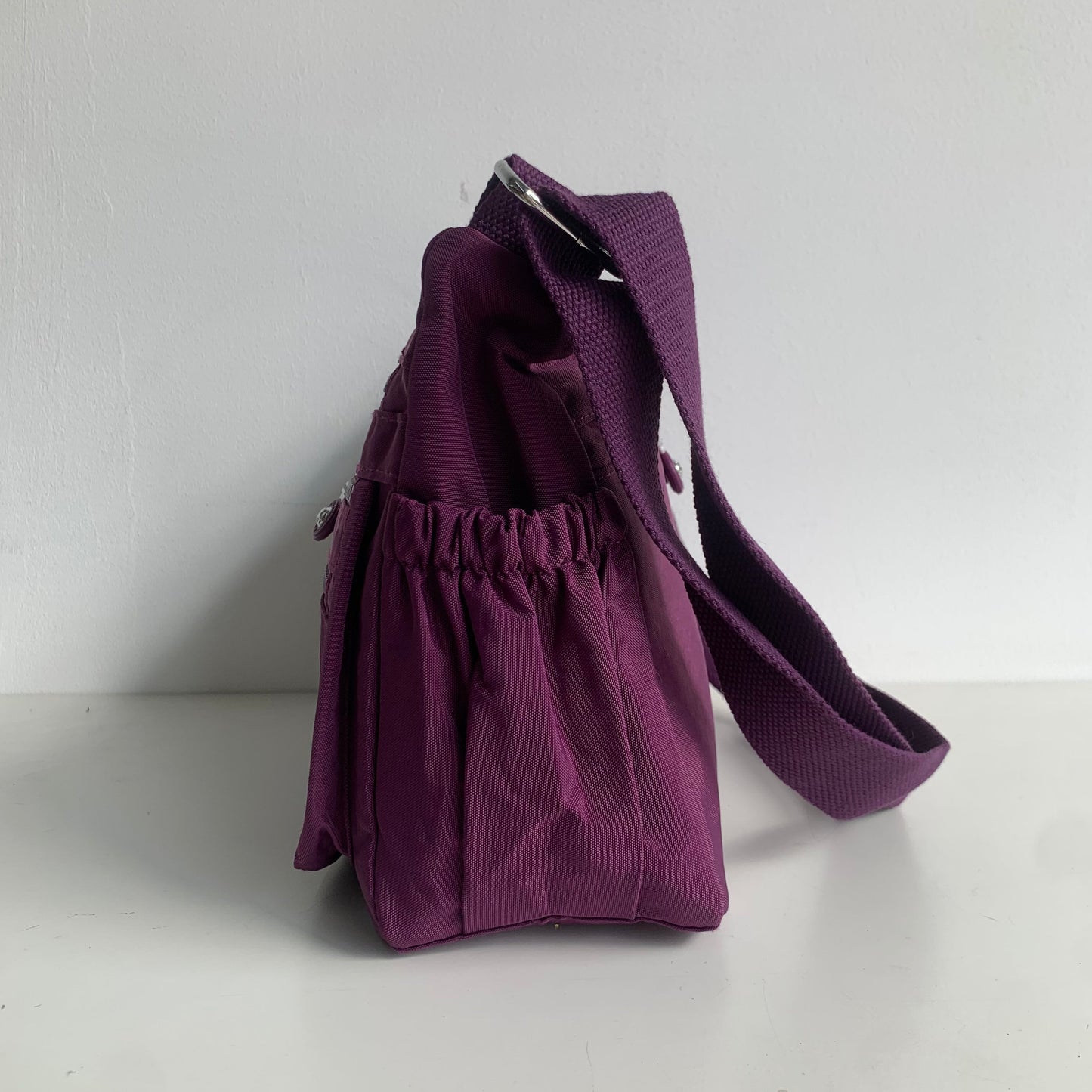 GESSY FRONT TRIPLE ZIP NYLON CROSSBODY BAG IN PURPLE