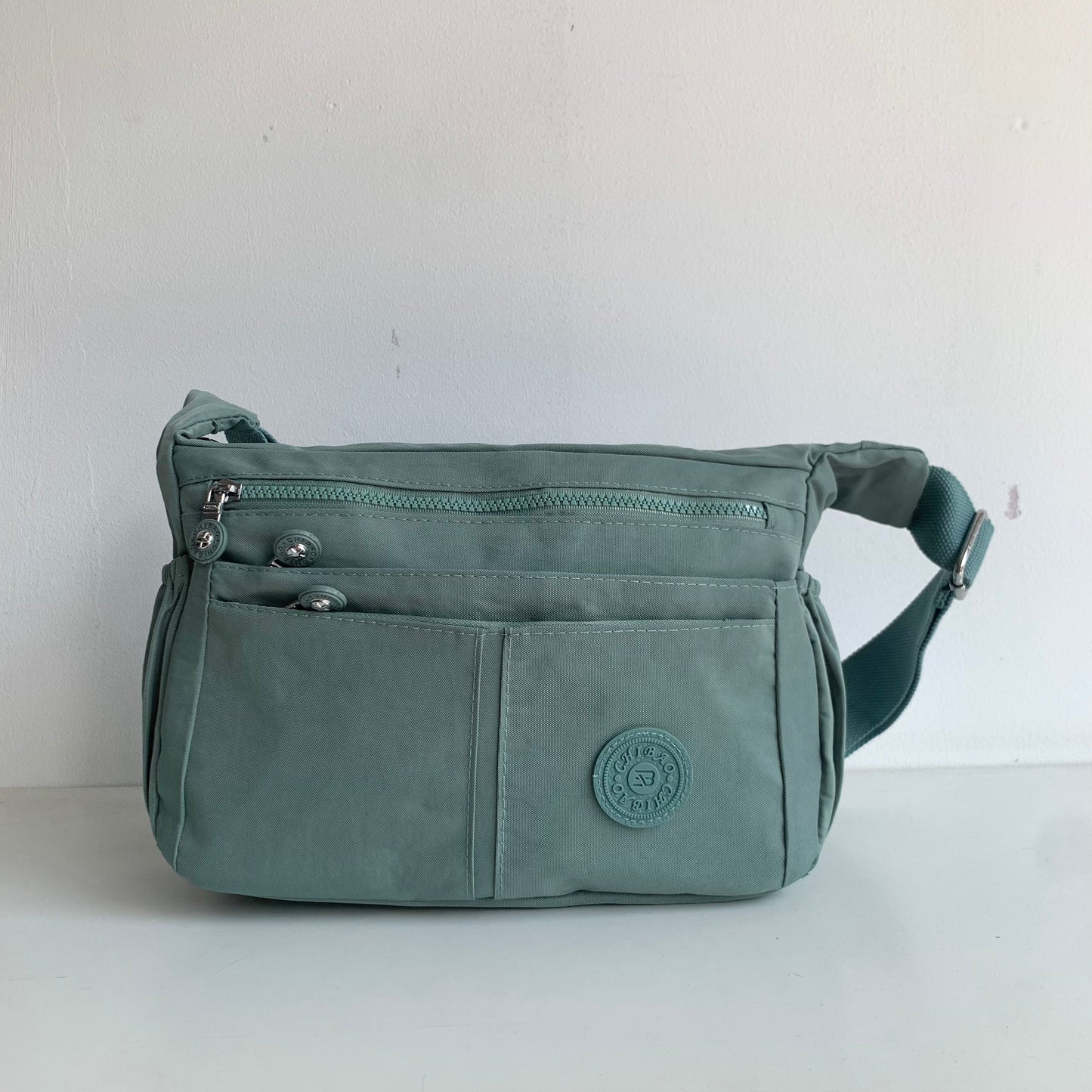 GESSY NYLON MULTIFUCTIONAL CROSSBODY BAG IN GREEN