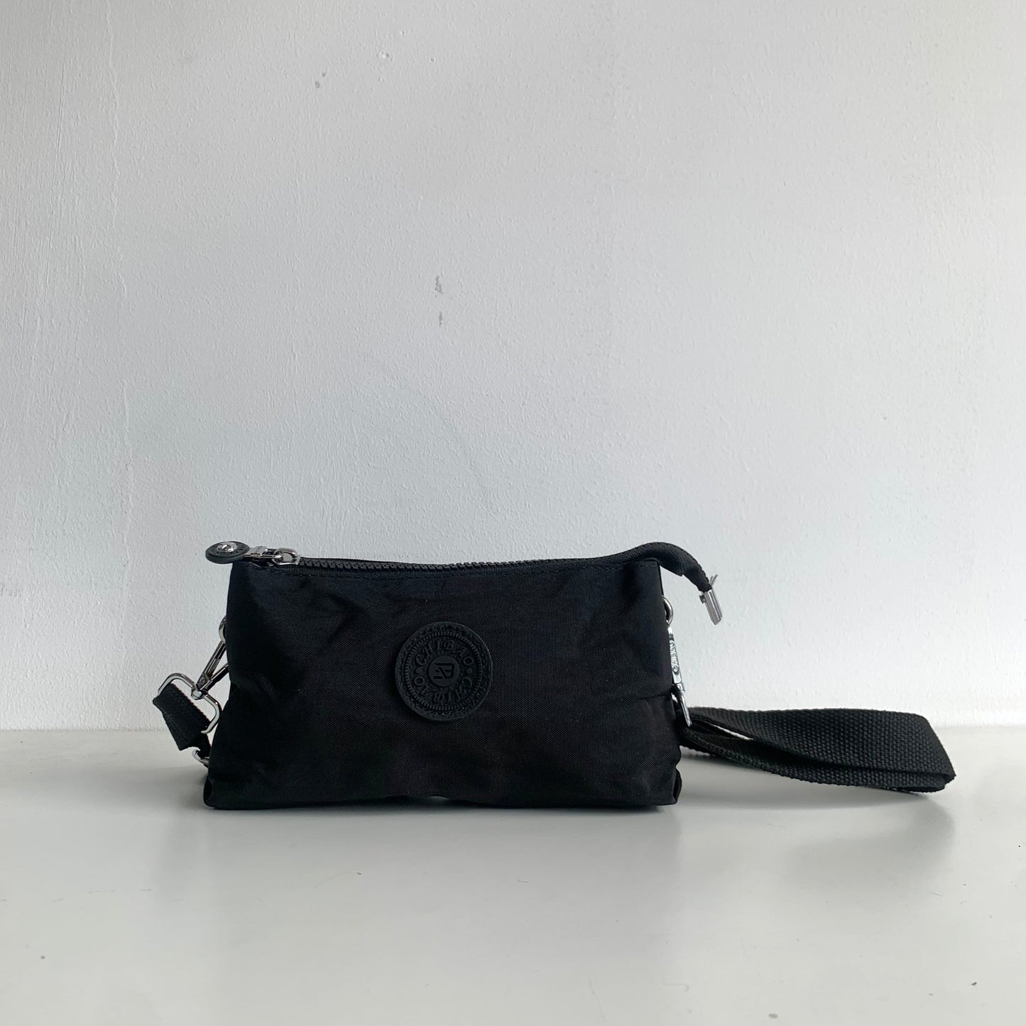 GESSY SMALL NYLON CLUTCH CROSSBODY BAG IN BLACK