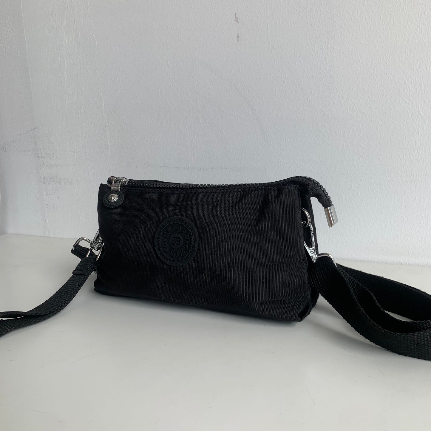 GESSY SMALL NYLON CLUTCH CROSSBODY BAG IN BLACK