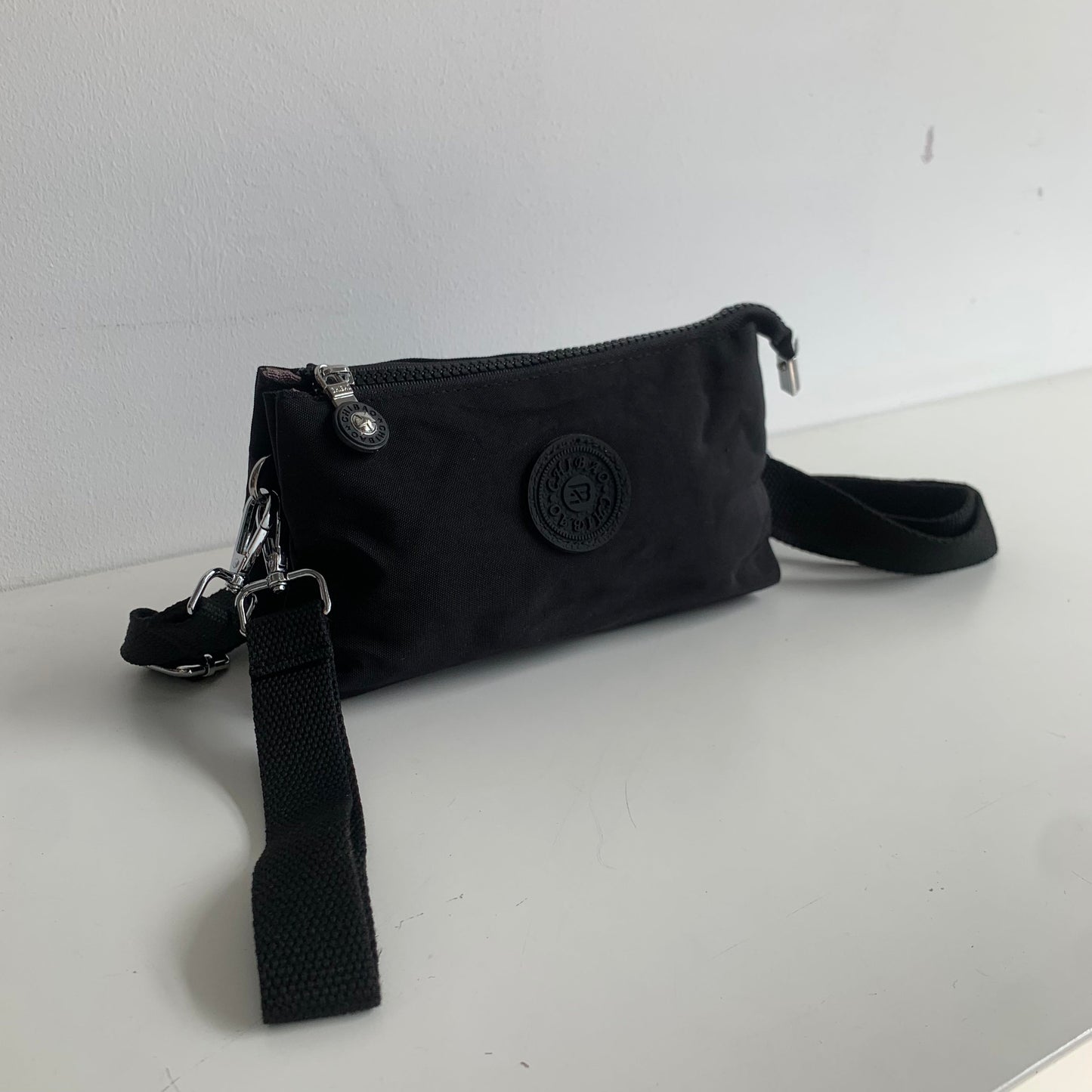 GESSY SMALL NYLON CLUTCH CROSSBODY BAG IN BLACK
