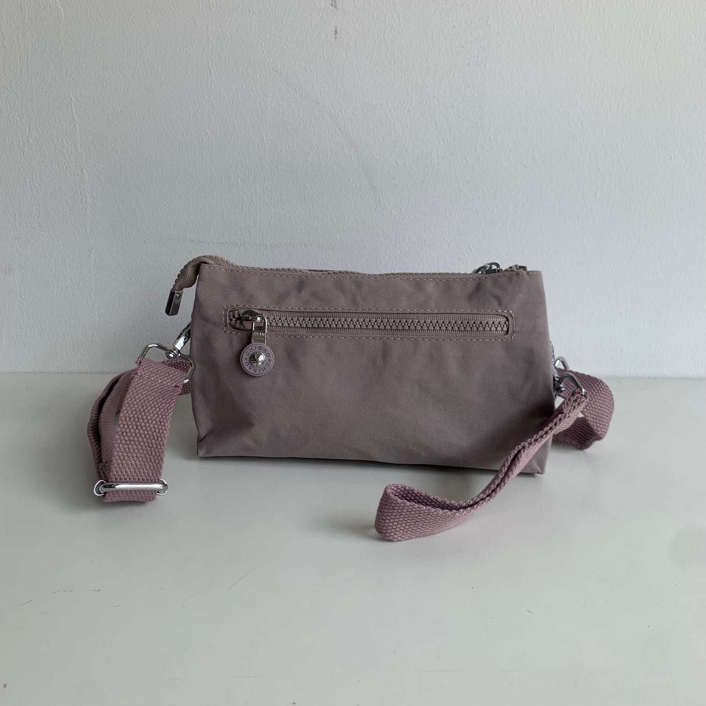 GESSY SMALL NYLON CLUTCH CROSSBODY BAG IN PINK