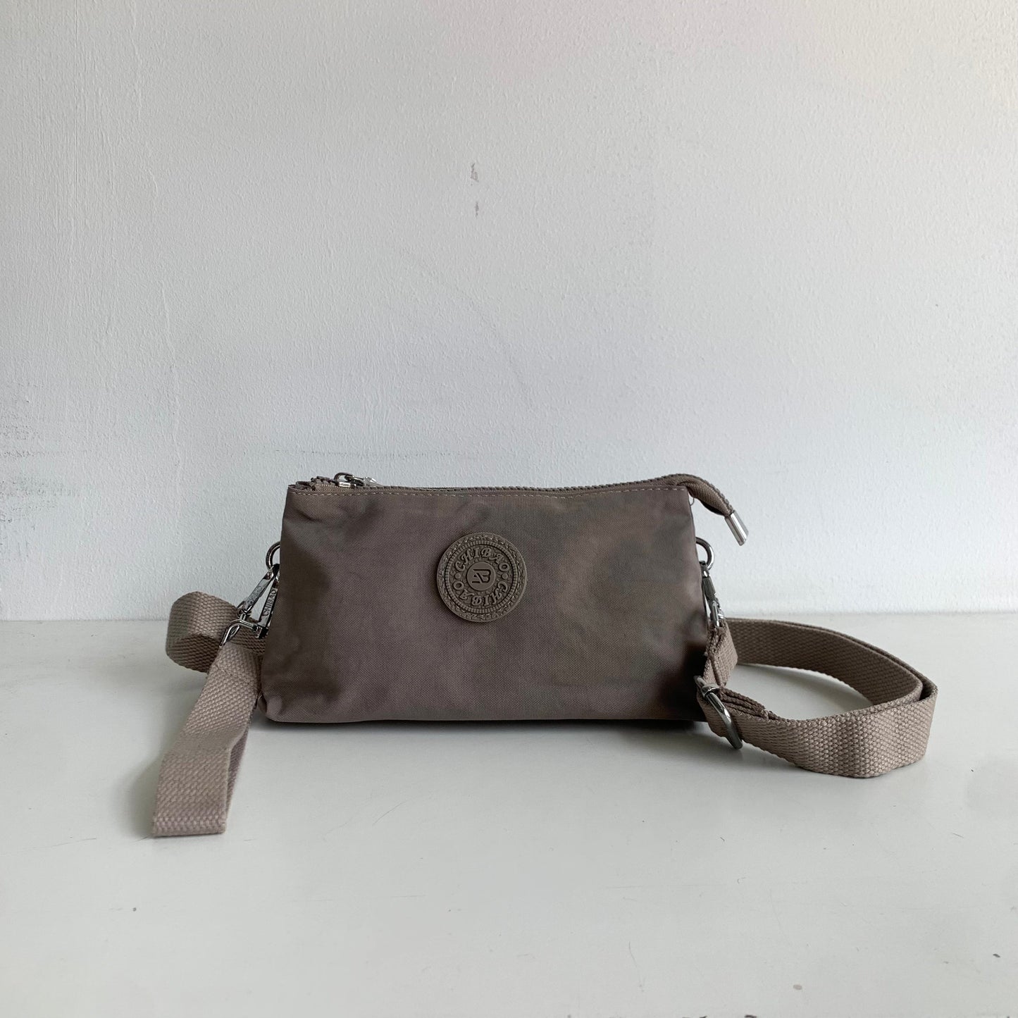 GESSY SMALL NYLON CLUTCH CROSSBODY BAG IN PINK