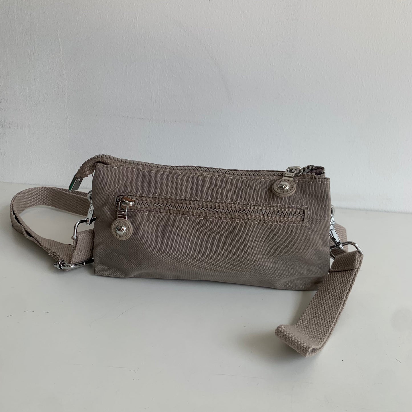 GESSY SMALL NYLON CLUTCH CROSSBODY BAG IN BROWN