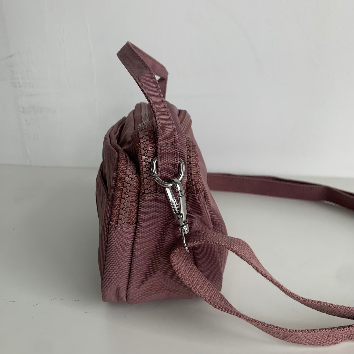 GESSY SMALL WATERPROOF UNISEX TOP HANDLE NYLON CROSSBODY BAG IN DARK PINK