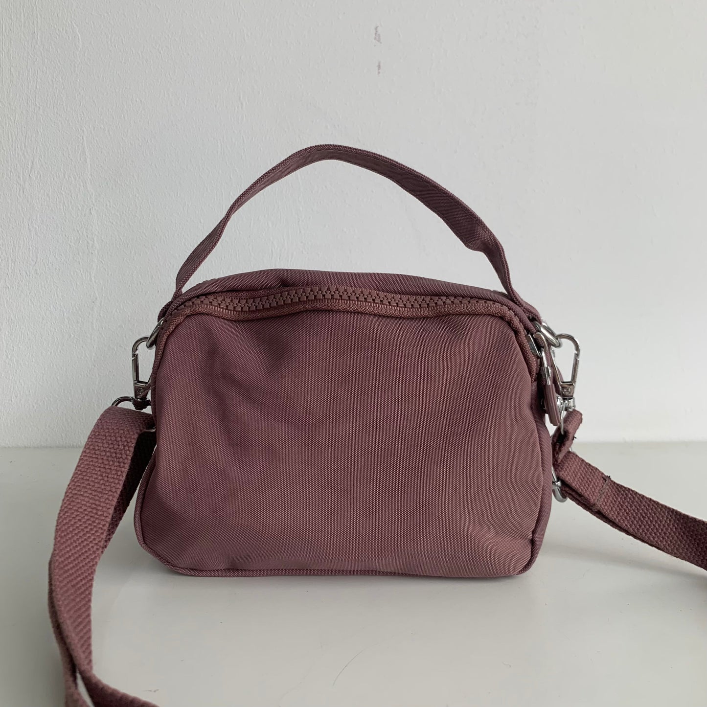 GESSY SMALL WATERPROOF UNISEX TOP HANDLE NYLON CROSSBODY BAG IN DARK PINK