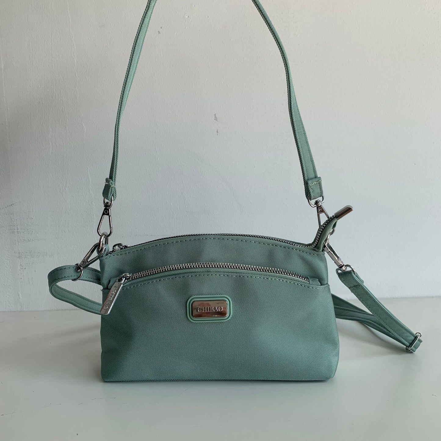 GESSY MULTI-LAYER CROSSBODY BAG IN GREEN