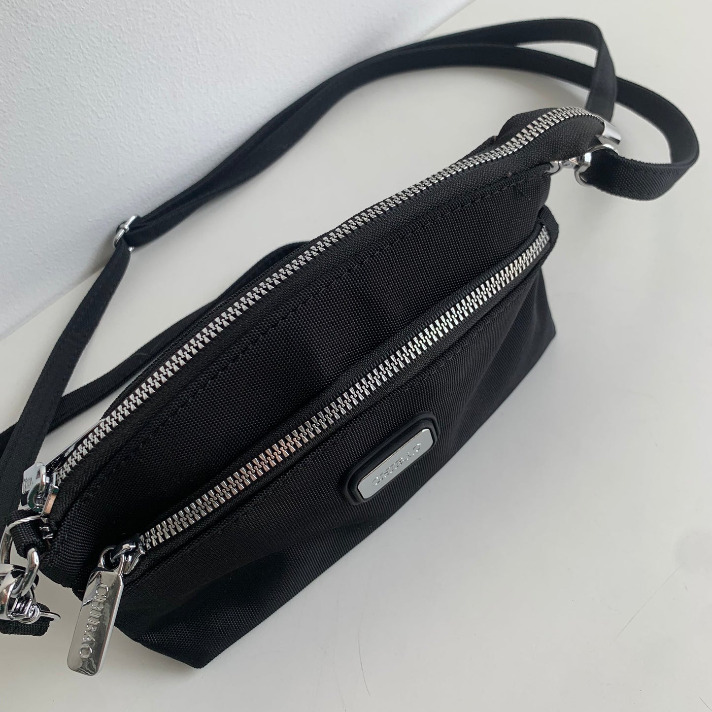 GESSY MULTI-LAYER CROSSBODY BAG IN BLACK