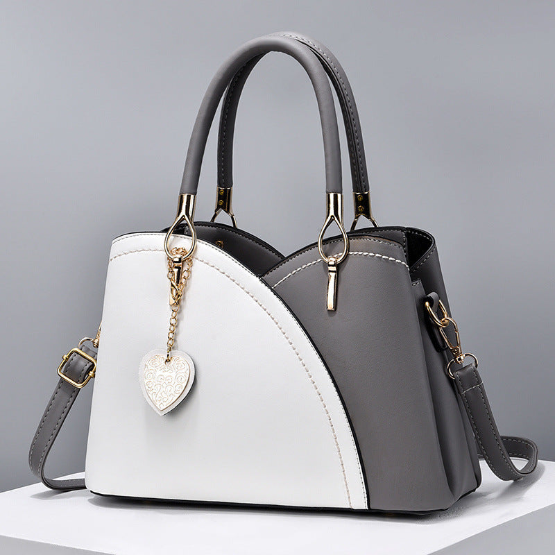 GESSY COLORBLOCK HEART SHAPE BAG IN GREY