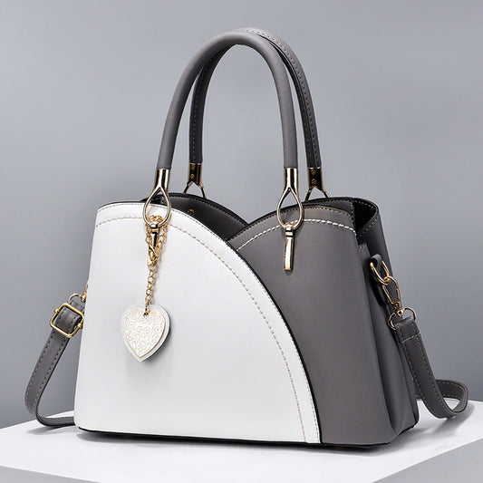 GESSY COLORBLOCK HEART SHAPE BAG IN GREY