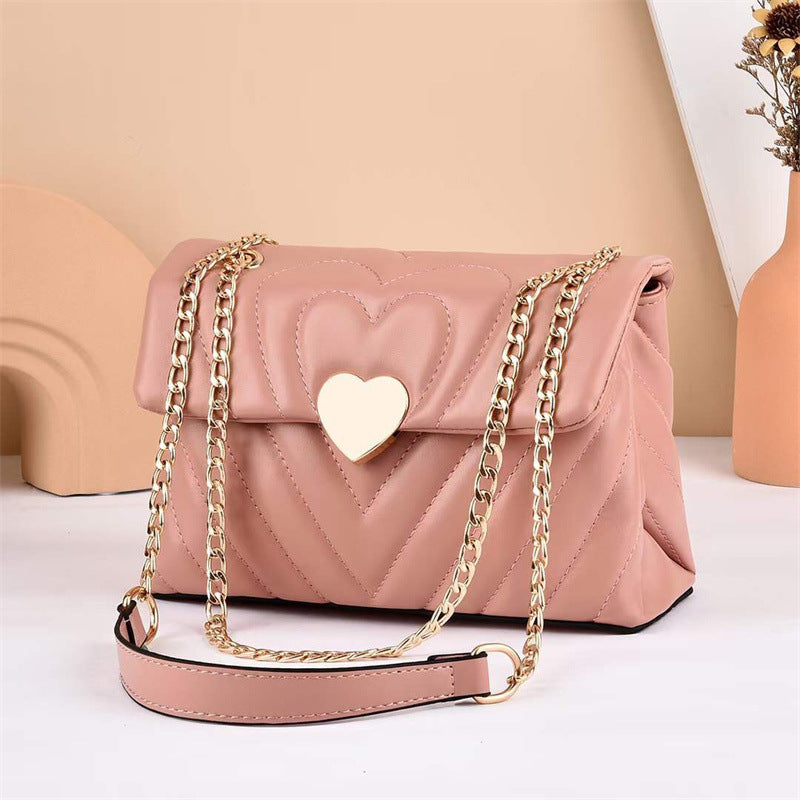 GESSY CROSSBODY FLAP BAG WITH HEART PATTERN