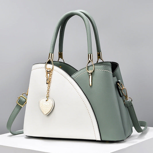GESSY COLORBLOCK HEART SHAPE BAG IN GREEN