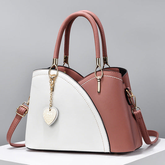 GESSY COLORBLOCK HEART SHAPE BAG IN PINK