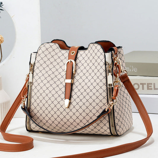 GESSY RETRO MESH PRINT METAL SNAP BUCKET BAG IN KHAKI