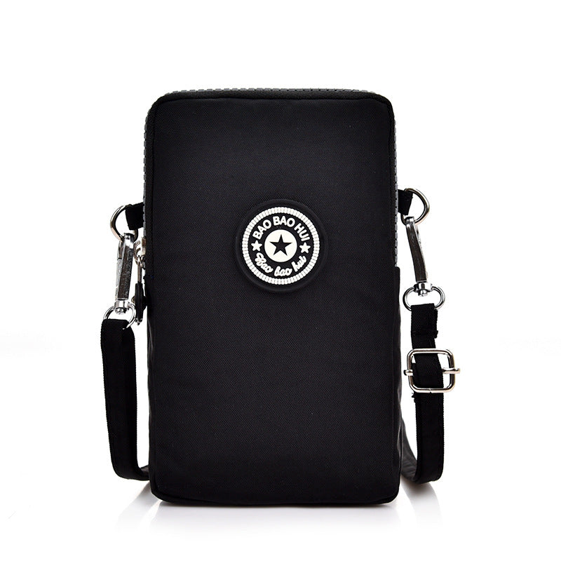 GESSY CROSS BODY PHONE BAG IN BLACK NAVY AND PINK