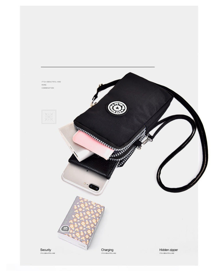 GESSY CROSS BODY PHONE BAG IN BLACK NAVY AND PINK