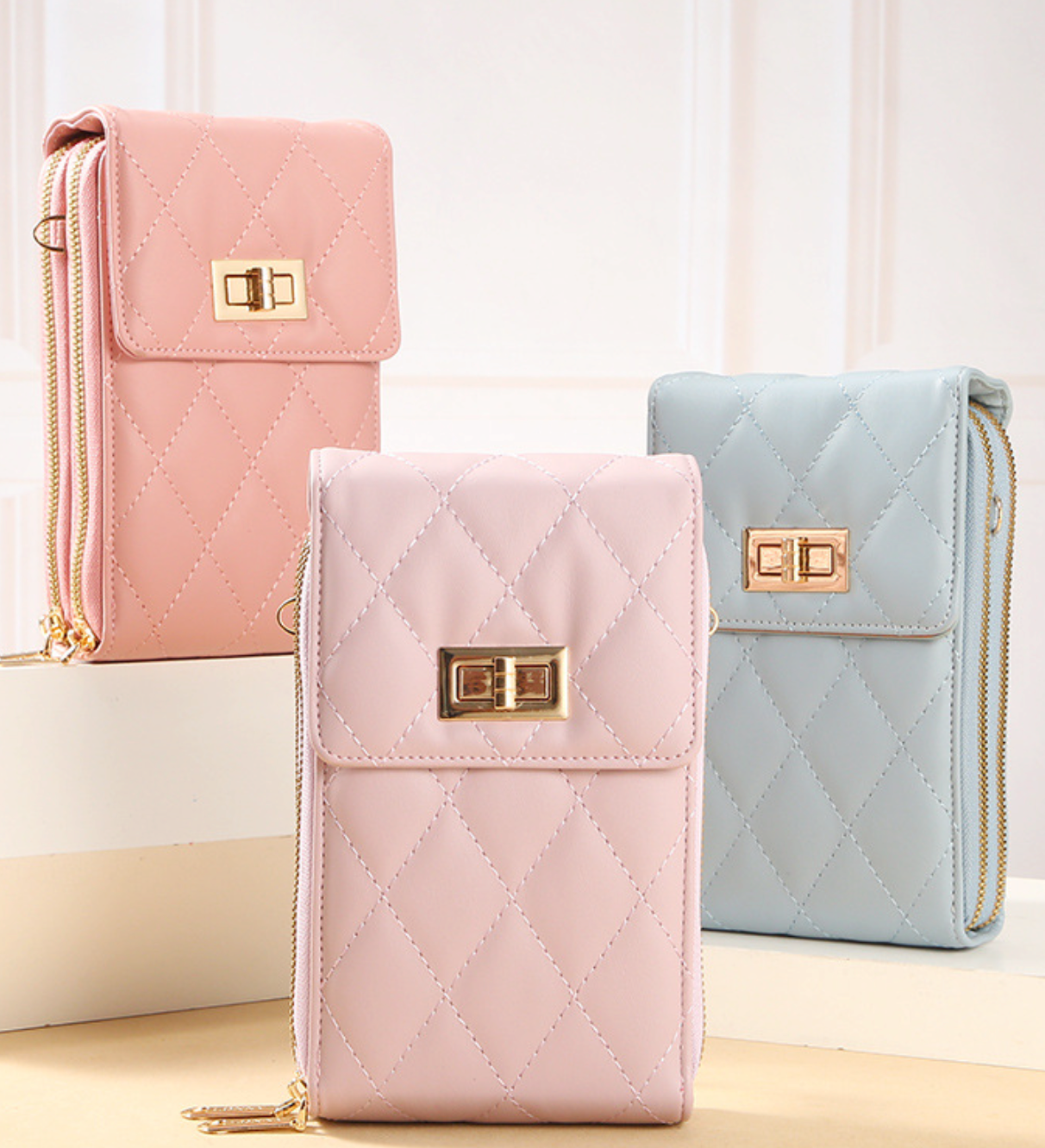 GESSY QUILTED DIAMOND SHAPED METAL SNAP CROSSBODY FLAP PHONE BAG IN PURPLE