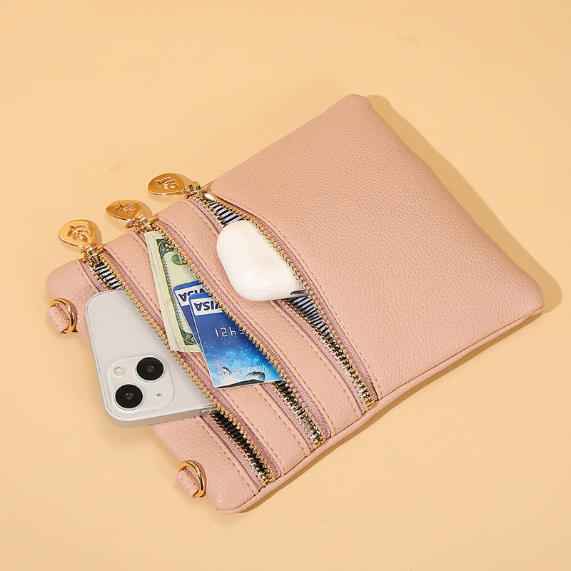 GESSY TRIPLE ZIP SMALL CROSSBODY BAG IN PINK
